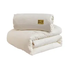 Folded cream quilt